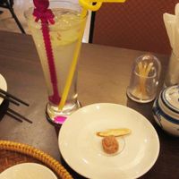 Lemon juice (lemonade) with licorice and salted apricot (the waitress put them on the side because she didn't think foreigners would like them. at Tinh Quan in Hue