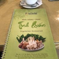 Menu and ginger tea at Tinh Quan in Hue