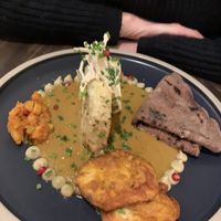 A celebration of celeriac (steak, pakoras, achaar, remoulade, chutney) with pearl millet bread - delicious   at Késarum in Southampton