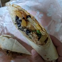 Caribbean Jerk wrap (no cheddar sub plant based chicken) at Tropical Smoothie Cafe in Rochester