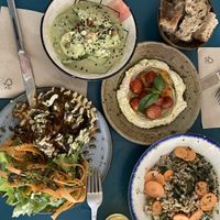 Potatoes galette with eggplant and tomato’s and salad, zucchini ceviche, cashew tartinade, buckwheat risotto.   at Mariposas in Marseille