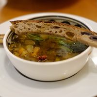 Soupe du jour : légumes moulinés, épicé façon couscous, toast géant aux olives noires at Mariposas in Marseille