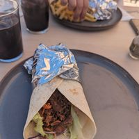 Beef wrap with sangria in background yum!! at Florence Cafe in Benalmadena