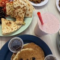 Vegan Strawberry Milkshake, Vegan Breakfast Quesadilla comes with home fries, Vegan Blueberry Pancake Stack comes w a “meat" (I did bacon)  at Mattie's Diner in Charlotte