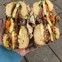 everything bagel with miso eggplant, carrot lox, avocado, cucumber, tomato, zough  at Flo's Appetizing in Amsterdam