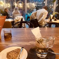 Speciale hortus thee met korenbloemen en huisgemaakt vegan dadeltaartje  at Hortus Grand Cafe in Leiden