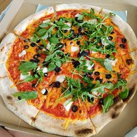 Black olives, vegan feta and arugula at Pizza Z Piecca in Warsaw