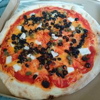 Black olives, vegan feta and capers at Pizza Z Piecca in Warsaw
