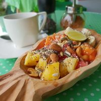 Fruit Mix with seeds & nuts + Balinese coffee at Akar Cafe in Lovina