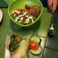 wrap hummus falafel and salad with rice and eggplant. 144K for the 2 dishes at Akar Cafe in Lovina