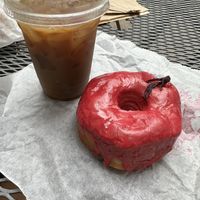 Hibiscus doughnut and almond milk cold brew  at Dough Doughnuts - Rockefeller in New York City