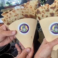 Street crepes with the rainbow gnome logo at Cup & Crêpe in Everett