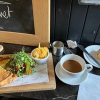 Vegan mozzarella, pesto and sun-dried tomato toastie with oat milk coffee and maple and pecan vegan and gluten free flapjack. Yum at Tyninghame Smithy in Tyninghame
