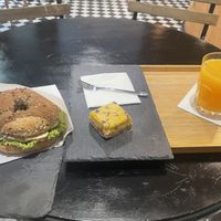 Tofu bagel, passionfruit slice and orange juicee  at Robert Capa Café in Budapest