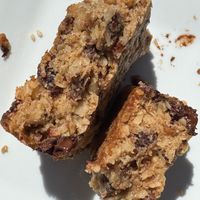 Inside of the granola bar.  You can see it’s got a cakey binder rather than sticky binder.  Much more of a flapjack than a granola bar.  Both raisins and chocolate chips. Yum!  at Elements: Books Coffee Beer in Biddeford