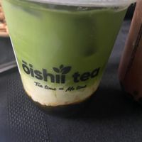 Mango matcha green tea latte with oat milk and black pearl boba.  at Oishii Tea in Brampton