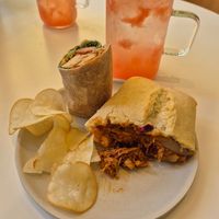 I split the wrap and ciabatta with my partner to try both. at Cosmos Grocery Cafe in Seoul