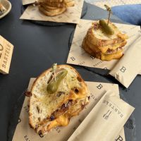 Three vegan grilled cheese sandwich options, subbed with real cheese   at Bartels in Bangkok