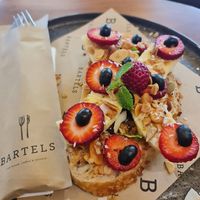 Sourdough with Peanut butter, Nutella, granola & fruit at Bartels in Bangkok