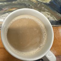 Oat milk latte for here  at MochaLisa's Caffè in Clifton Park