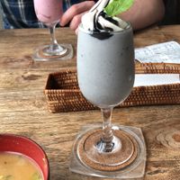 Black sesame milkshake front, strawberry milkshake back at Vegans Cafe and Restaurant in Kyoto