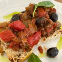 Eggplant, capsicum, olives and zucchini sauce on bread at The Botanist in Zadar