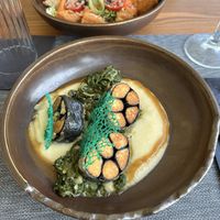 tofu “fish” with white wine and cauliflower sauce topped with chard  at The Botanist in Zadar