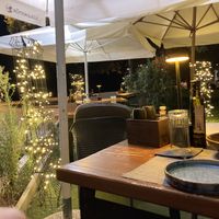 The outdoor setting at night!  at The Botanist in Zadar