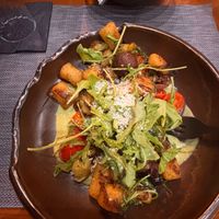 Gnocchi au gratin, with brussel sprouts, tomatoes, meatballs, rocket(arugula) and a pesto sauce  at The Botanist in Zadar