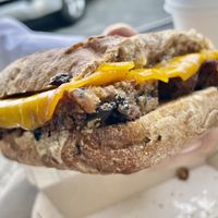 Vegan Scrapple Sandwich - housemade vegan scrapple, vegan gouda, maple syrup spread, on a cinnamon raisin philly muffin  at Haddon Culinary in Collingswood