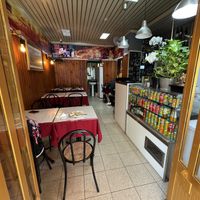 Inside (also has tables outside)  at Kasthamandap Restaurant And Cafe House in Lisbon