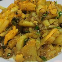 Fried potato spiced dish at Kasthamandap Restaurant And Cafe House in Lisbon