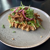 Funghi with potato waffle: very flavoursome with well-marinated oyster mushrooms. The potato waffles contained nice herbs as well.  at Cravings For Green in Ede