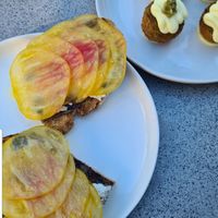 Tomatoes on toast & Potato croquettes at Plates in London