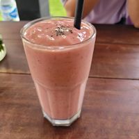 Strawberry Banana smoothie with Lime and Protein Powder at Goji Goji Vegan Bowl in Canggu