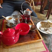 Red teapot: Rukeri tea; glass teapot: hibiscus tea; dessert: Earl Grey and lemon cake at Tea Sutra Teahouse in Newcastle Upon Tyne