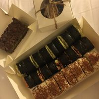 Sushi rolls set , Chocolate basil cake and a bunch of sweets  at Nebos in Kyiv