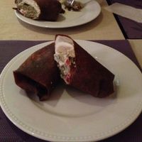 Burrito with falafel and cherry tomatoes at Nebos in Kyiv