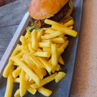 Linsenburger mit Pommes at Berghotel Oeschinensee in Kandersteg