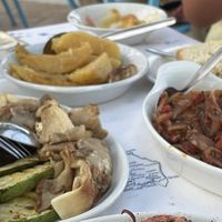 Bean fava, grilled vegetables, roasted potteries and stuffed aubergines with roasted onions and tomato sauce   at Paradise Beach  in Kefalonia