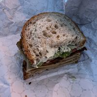Absolute unit of a sandwich. The Californian. Thought to take a picture after devouring the first half    at Maciel's Plant-Based Butcher & Deli in Los Angeles