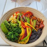 Build your own bowl with sweet potato picadillo, black beans, yellow rice, and vegetables at Cocina Cubana in Santa Rosa Beach