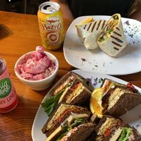 Spicy Portobello Wrap (a special of the day), Tempeh Club, and pink potato salad! at End of the Line Cafe in Pensacola