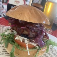 Vegan burger, onion chutney some cabbage tomatoes and rocket - vegetarian with sour cream   at Pick'n'eat in Olomouc