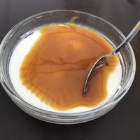 Vegan panna cotta with caramel sauce  at FOMU Café in Antwerpen