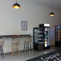 seating area on the left at Bistro La Cucina Verde in Saarbrucken