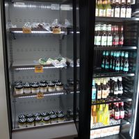 Cold vegan beverages and vegan food (faux meat, etc.) for sale at Bistro La Cucina Verde in Saarbrucken
