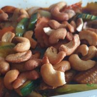 Take out box with oumph and cashew wok at Mae Thai in Solna