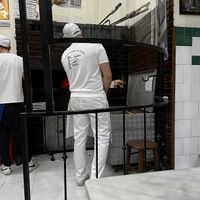 Pizza making in action  at Pizzeria da Michele in Naples
