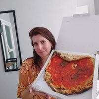 Eating pizza at our Airbnb 5 minutes by foot from the pizzeria 😂😂😂 at Pizzeria da Michele in Naples